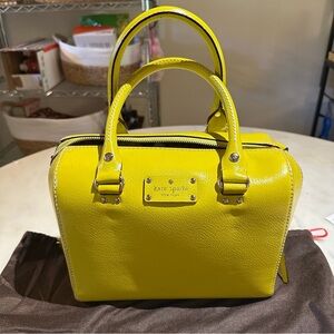 Kate Spade Bag with small stains ( shown in photos) new without tag